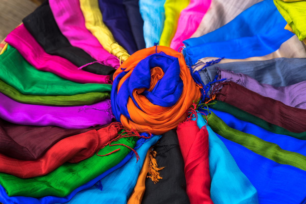 Stack of colourful silk scarfs